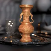 На память: Бронзовая ваза с ручками-слонами — фотография 1